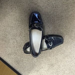 Navy blue patten leather loafers with silver