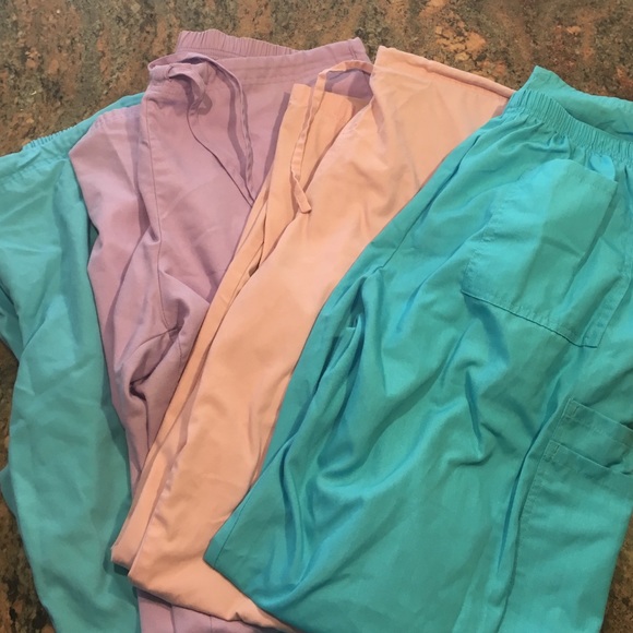 4 pairs of medium scrubs
