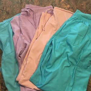 4 pairs of medium scrubs