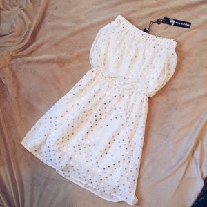 Strapless white dress with silver polka dots