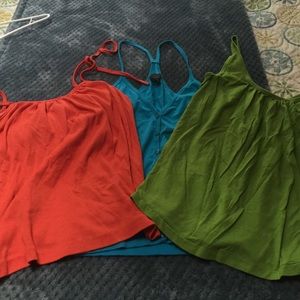 Three small women's tanks