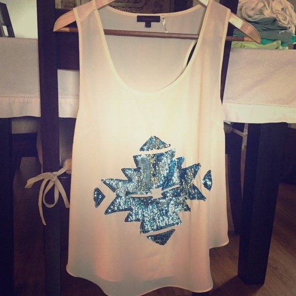 Flowy white top with blue sequins