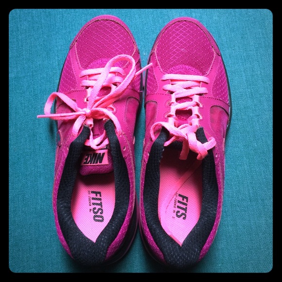 Pink nike running shoes