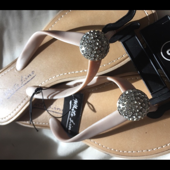 Nude flip flops