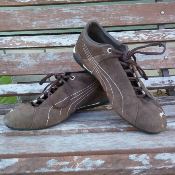 Brown suede pumas