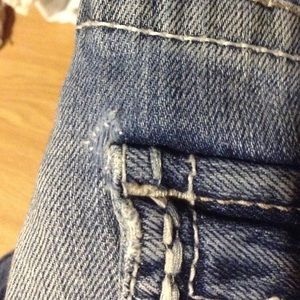 Corners of back pockets.