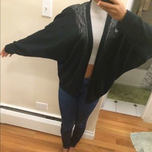 Black batwing sweater with wing detail