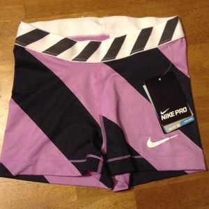 Purple And black Nike pros