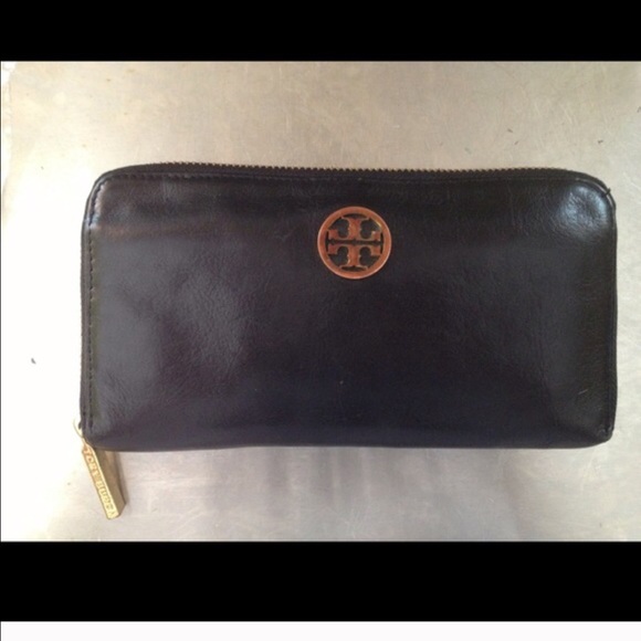 Tory Burch wallet with gold detailing.