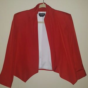 Cropped red bebe jacket.