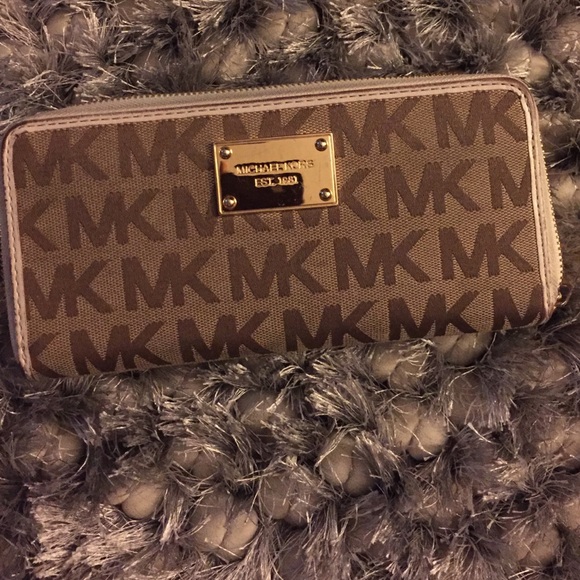 Authentic Michael Kors ivory and gold wallet