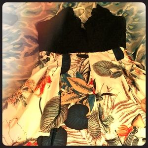 Romper black and floral by fashion size medium