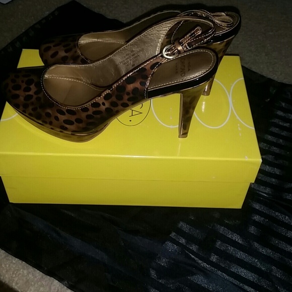 Brand new Cheetah sling backs