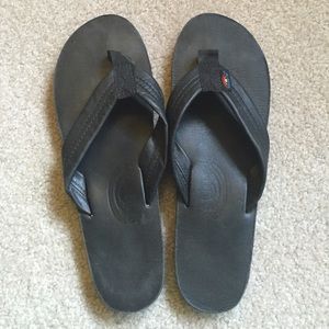Black rainbow flip flops. Leather
