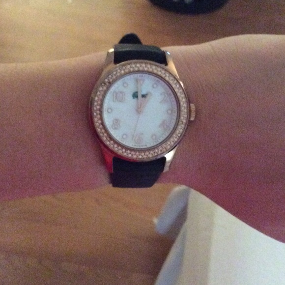 Lacoste with rose gold and Mother of Pearl face