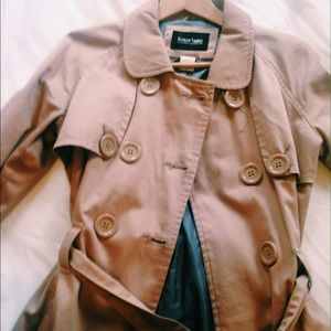 Tan trench coat.