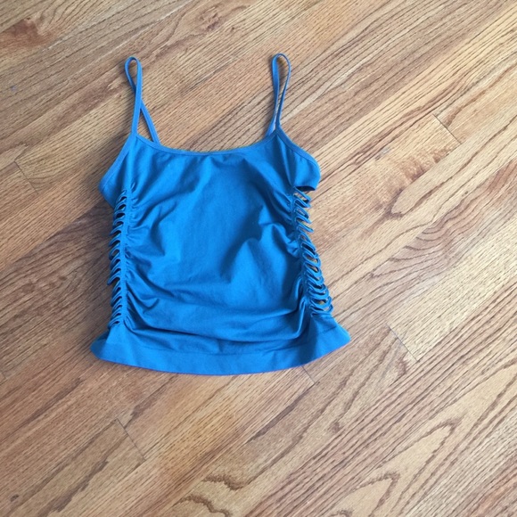 Teal fitted top with openings on sides