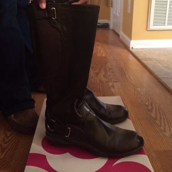 Chocolate brown riding boots.