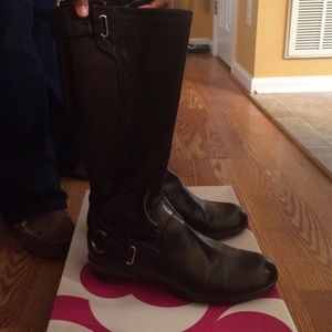 Chocolate brown riding boots.