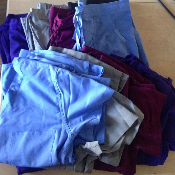 4 pairs of small scrub tops & bottoms