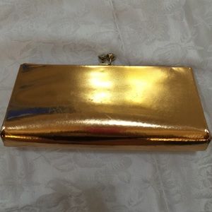 Vintage metallic gold barbie clutch