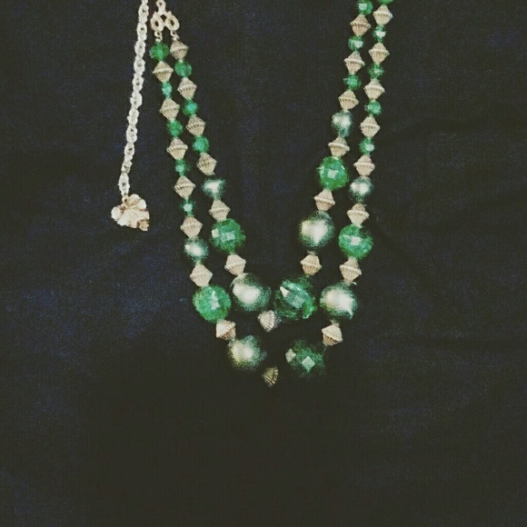 Green and gold necklace with leaf accent