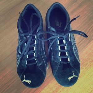 Black and white suede puma sneakers