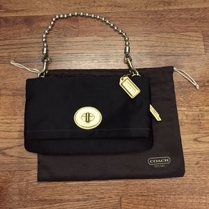 Coach black satin clutch with purple satin lining