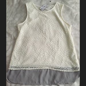 Cream lace and gray flowy sleeveless blouse