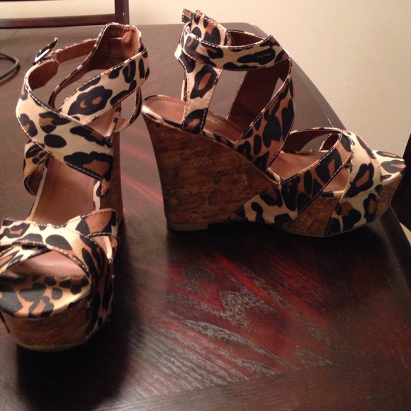 Leopard print wedges. About 5 1/2 inches.