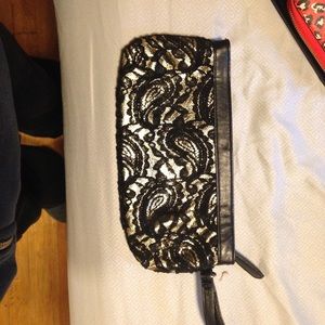Gold and black lace clutch