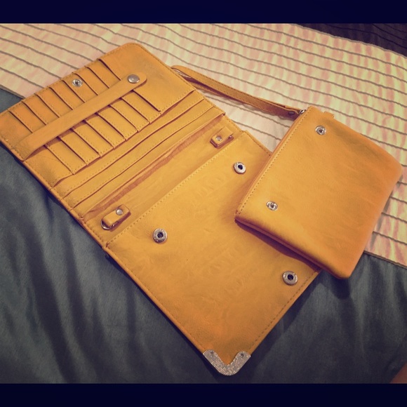 Wallet with removable Wristlet