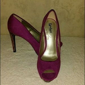 Purple suede snakeskin pumps
