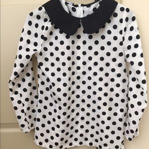 polka-dotted blouse