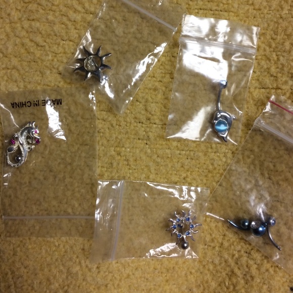 Lot of five navel rings