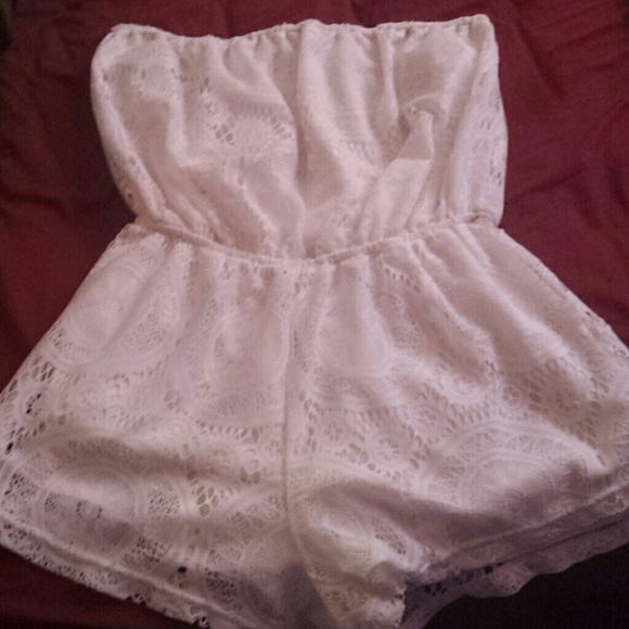 A white lace romper from Charlotte russe