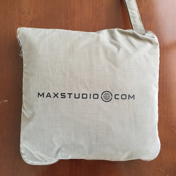 Coat Folds into a Pouch!