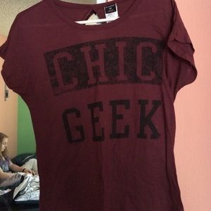 Maroon colored shirt.