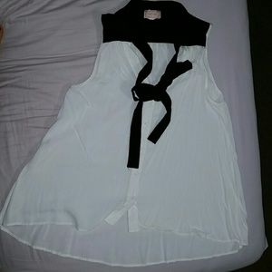 Hi-low black and white flowy sleeveless shirt
