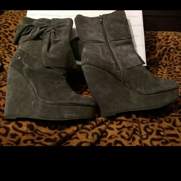 Calvin Klein gray suede boots....price is firm