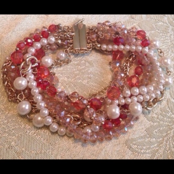 Bracelets and a pair of earrings .