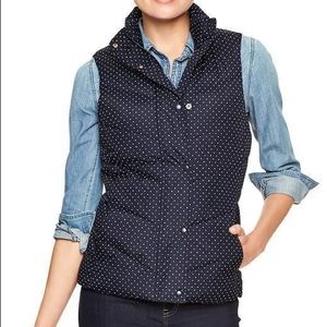 New with tags. Navy blue and polka dot vest
