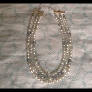 Two White House Black Market Necklaces .