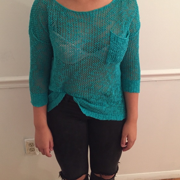 a mid-arm knit sweater