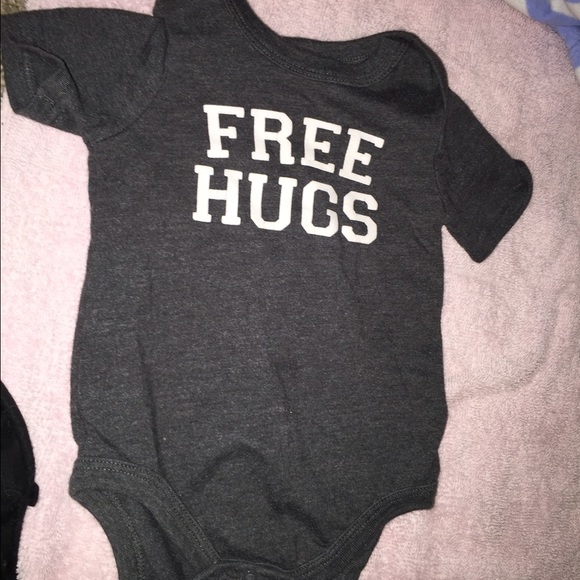 Baby boy " free hugs" onsie.