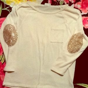 Slouchy cream sweater with sequin elbow patches
