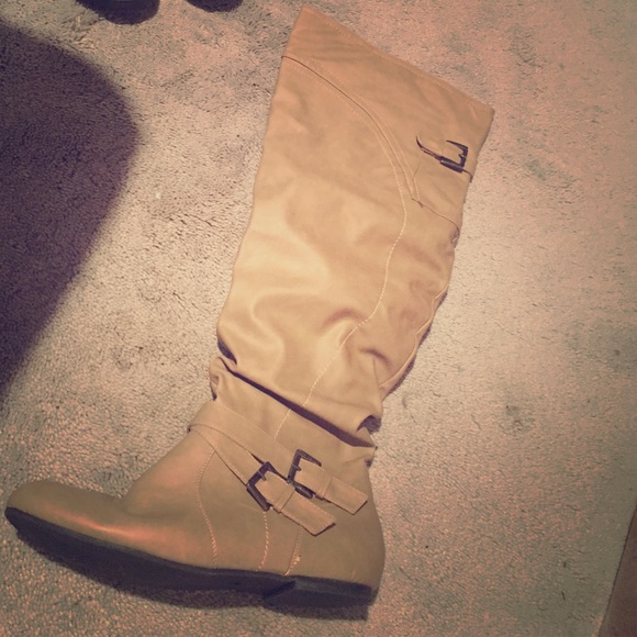 Flat over the knees boots.