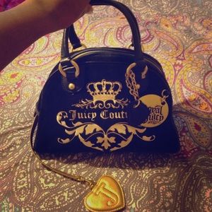 A gorgeous black juicy couture handbag