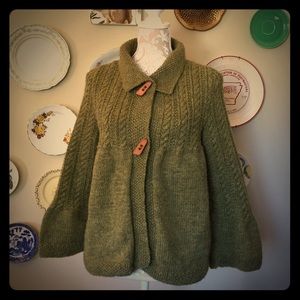 Hand knit wool tweedy cardigan sweater.