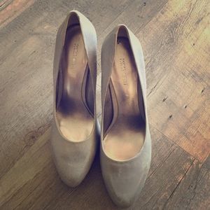 Slate colored, leather Nine West platform pumps.